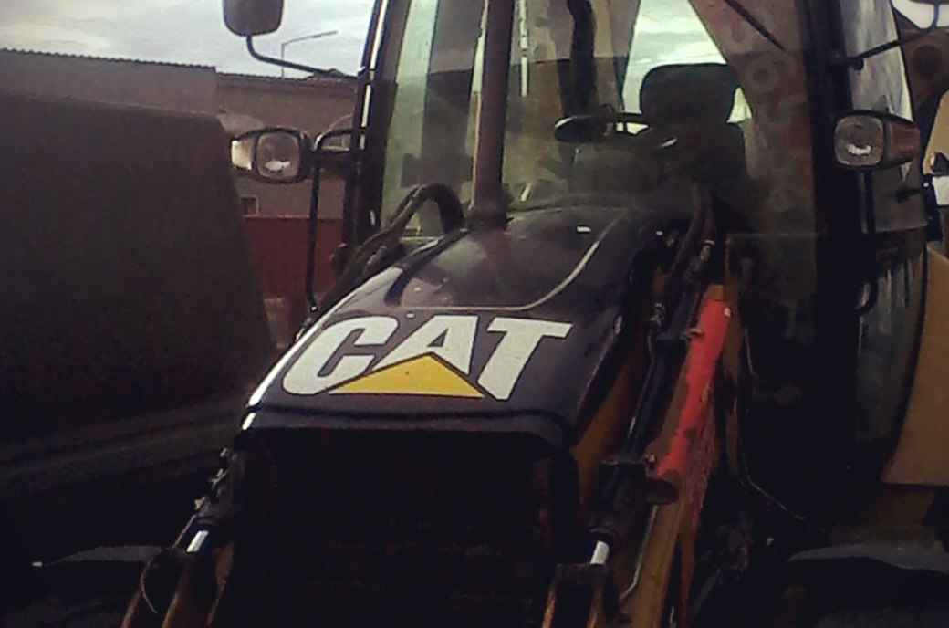 Экскаватор-погрузчик CAT428E